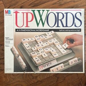 Upwards.  A 3-D word game.  64 letter tiles, 4 plastic racks, game board unit.